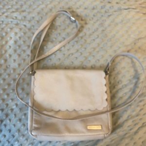 Leather crossbody purse with compartments. Soft calfskin grey scalloped flap.